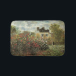 Monet's tuin in Argenteuil door Claude Monet Badmat<br><div class="desc">De Artiestuin in Argenteuil (een hoek van de tuin met Dahlias) (1873) van Claude Monet is een schilderij van de impressionistische kunst met florale natuur. Een boerderij-huis van een land bevindt zich op de achtergrond. Een stel verliefd loopt langs een romantische tuin in het voorjaar met bloeiende rozen en andere...</div>