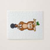 Monkey bij Sterke training met Dumbbell Legpuzzel (Horizontaal)