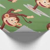 Monkey op een handvol glanzend opvulpapier cadeaupapier (Hoek)