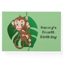 Monkey op een toonboek over een wijnontwerp