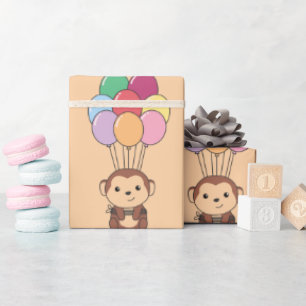 Monkey vliegt omhoog met een kleurrijke ballonkaar cadeaupapier