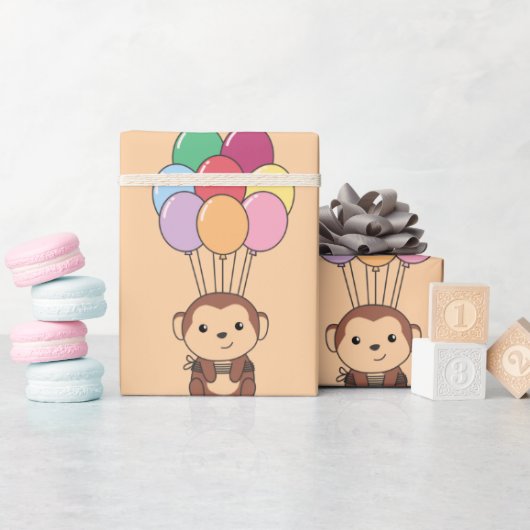 Monkey vliegt omhoog met een kleurrijke ballonkaar cadeaupapier (Baby Shower)