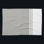 Monochromatische moderne witte en grijze theedoek<br><div class="desc">Upgrade de esthetiek van uw keuken met onze monochromatische moderne witte en grijze keukenhanddoek. Deze handdoek is niet alleen een functioneel stuk voor uw keuken; het is een stijlvol accessoire dat een vleugje eigentijdse elegantie toevoegt. Het ontwerp is voorzien van eenvoudige maar chique gestreepte balken, waardoor een look wordt gecreëerd...</div>