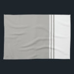 Monochromatische moderne witte en grijze theedoek<br><div class="desc">Upgrade de esthetiek van uw keuken met onze monochromatische moderne witte en grijze keukenhanddoek. Deze handdoek is niet alleen een functioneel stuk voor uw keuken; het is een stijlvol accessoire dat een vleugje eigentijdse elegantie toevoegt. Het ontwerp is voorzien van eenvoudige maar chique gestreepte balken, waardoor een look wordt gecreëerd...</div>