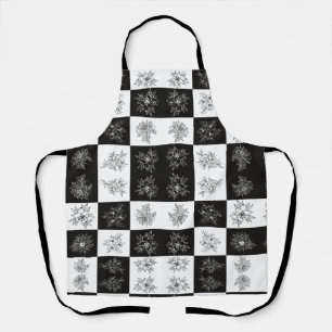 Monochrome bloemen en schaakbordpatroon schort