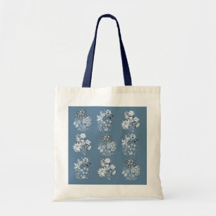 Monochrome bloemen in blauw tote bag