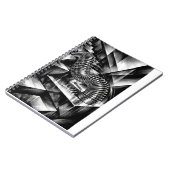Monochrome Slinky die naar beneden tuimelt over ch Notitieboek (Linkerzijde)