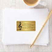Monogram Black Treble Clef op Golden Stripes Etiket (Insitu)