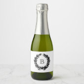 Monogram bruiloft krans illustratie sparkling wijnetiket (Voorkant)