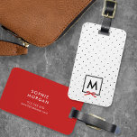Monogram Chic Red Ribbon Polka Dot Bagagelabel<br><div class="desc">Reizen in stijl met dit bagagelabel van het kerkmonogram met een zwart vierkant met een rood lint tegen een zwart-wit puntpatroon. Pas het aan door de placeholder tekst te vervangen. Voor meer opties zoals het veranderen van de doopvont en het is grootte/kleur of het uit elkaar plaatsen tussen brieven klik...</div>