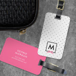 Monogram Chic Roze Lint Polka Dot Bagagelabel<br><div class="desc">Reis in stijl met dit chique monogram bagagelabel met een zwart omzoomd vierkant met een roze lint tegen een zwart-wit polka dotpatroon. Personaliseer het door de plaatsaanduidingstekst te vervangen. Klik op de knop "Aanpassen" voor meer opties, zoals het lettertype en de grootte/kleur ervan of de spatiëring tussen letters wijzigen. *Het...</div>