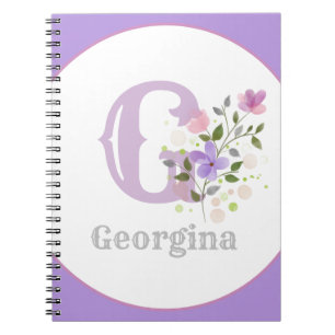 Monogram en naam met bloemen notitieboek