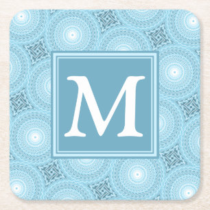 Monogram engel blauw cirkelpatroon kartonnen onderzetters
