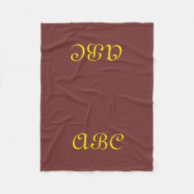 Monogram fleece deken donkerrood met goud