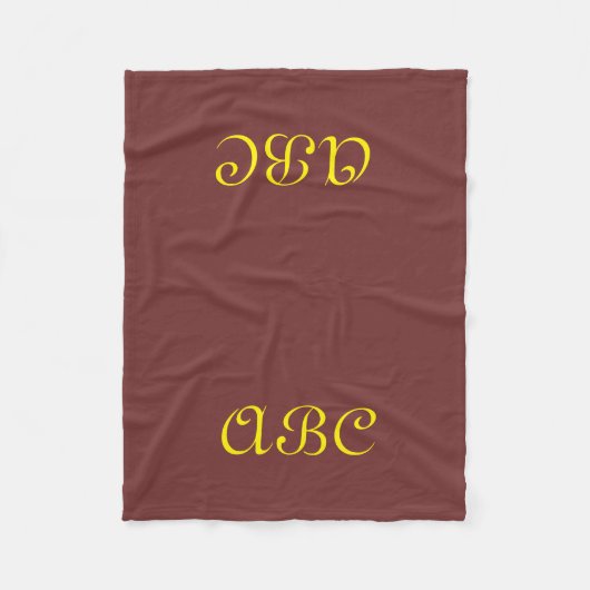 Monogram fleece deken donkerrood met goud (Voorkant)