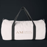 Monogram gepersonaliseerd roze Initiaal en naam Plunjezak<br><div class="desc">Reis in stijl met onze Minimalistische Monogram Gepersonaliseerde Pastel Pink Duffle Bag. Deze chique tas heeft een zacht pastelroze design, gemarkeerd met een strak monogram initiaal en uw eigen naam in een modern lettertype. Perfect voor de sportschool, weekendjes weg of dagelijks gebruik, deze ruime en duurzame plunjezak combineert functionaliteit met...</div>