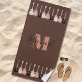 Monogram gitaarpatroon roestbruin strandlaken