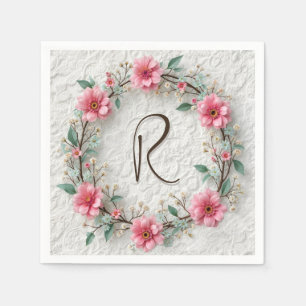 Monogram in elegante krans op kant servet