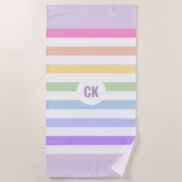 Monogram in witte cirkel pasta regenboogstrips strandlaken