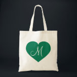 Monogram Kelly groen hart Tote Bag<br><div class="desc">Deze boodschappentas heeft een hart in kelly groen met een witte monogram beginletter in het midden.  Personaliseer door het formaat van het groene hart aan te passen en/of de tekst/monogram te personaliseren. Geweldig bruidsmeisje cadeau.</div>