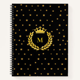 Monogram, kroon, lauwerkrans en gouden sterren op  notitieboek