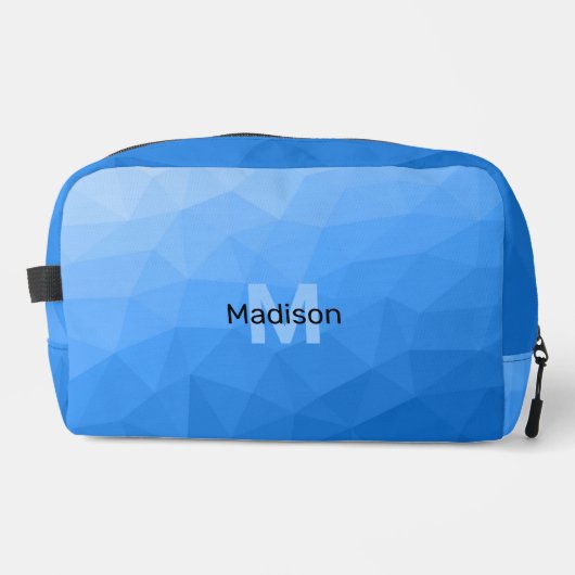 Monogram lichtblauw geometrisch maaspatroon toilettasje (Voorkant)