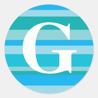 Monogram met een kleurrijke gestreept achtergrond  ronde sticker