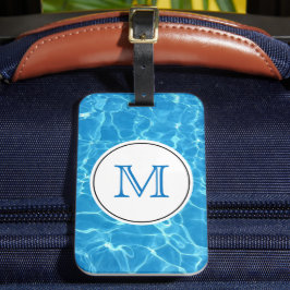 Monogram mousserend blauw zwemwater bagagelabel