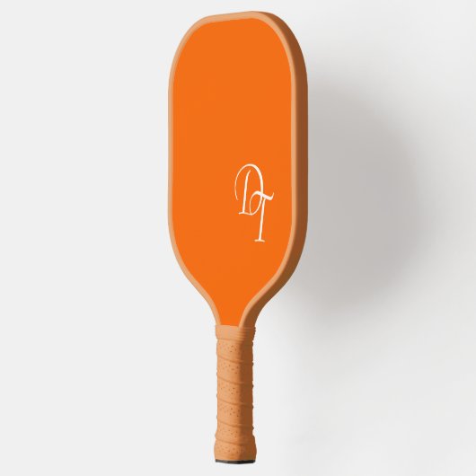 Monogram - neon sinaasappel pickleball paddle (Links)