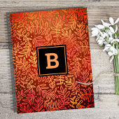 Monogram oranje bladpatroon modern eenvoudig notitieboek