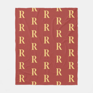 Monogram patroon bruin goud fleece deken