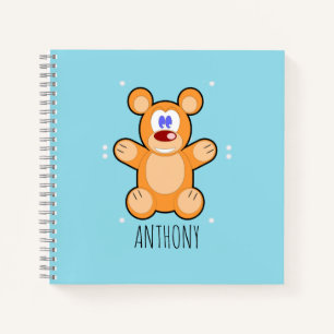 Monogram schattige bruine teddybeer op blauw notitieboek