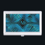 Monogram Turquoise Black Palms Visitekaarthouder<br><div class="desc">Tropische palmschijfjes in turquoise op zwart,  deze kaarthouder is geweldig voor visitekaartjes,  creditcards,  cadeaukaarten en is voorzien van je monogram aan de voorkant in een tekenfilm. Creëer voor jezelf of geven als geschenk. iPhone-draagtas,  andere iPad-draagtassen en meer items in onze winkel.</div>