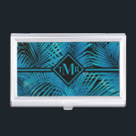 Monogram Turquoise Black Palms Visitekaarthouder<br><div class="desc">Tropische palmschijfjes in turquoise op zwart,  deze kaarthouder is geweldig voor visitekaartjes,  creditcards,  cadeaukaarten en is voorzien van je monogram aan de voorkant in een tekenfilm. Creëer voor jezelf of geven als geschenk. iPhone-draagtas,  andere iPad-draagtassen en meer items in onze winkel.</div>