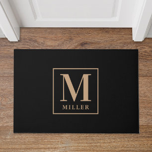 Monogram voor moderne zwarte en Tan familienaam Deurmat