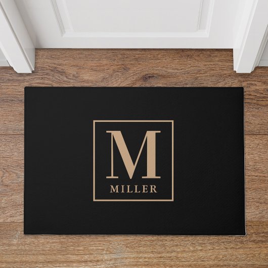 Monogram voor moderne zwarte en Tan familienaam Deurmat