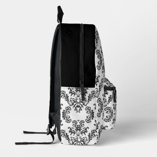 Monogram witte en zwarte demaspatroon bedrukte rugzak (Links)