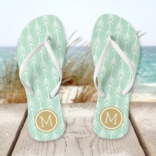 Monogram zeefoam en goudpijlen teenslippers
