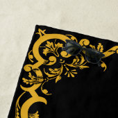 Monogram zwart en goud met decoratieve elementen M Strandlaken (In situ)