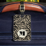 Monogrammed Animal Print Bagagelabel<br><div class="desc">Een stijlvol bagagelabel kenmerkt uw monogram initiaal op een beige en zwarte wilde dierprintpatroon op de voorzijde en uw adresinformatie die op de rug wordt gedrukt OF kies de stijl u uw visitekaartje op de rug kunt opnemen. Creëer voor jezelf of geven als geschenk. MATCHING-trektas en meer items in ons...</div>