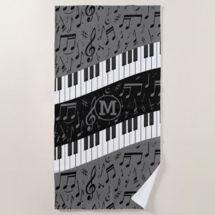 Monogrammen van pianosleutels en muzieknoten strandlaken