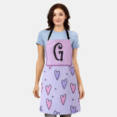 Monogramtekening van grillige kleine hartjes roze schort (Gedragen)