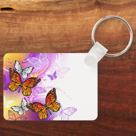 Monovlinders op Paarse Achtergrond Sleutelhanger (Voorkant)