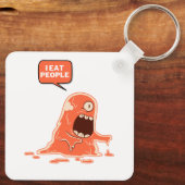 Monster eet mensen sleutelhanger (Achterkant)