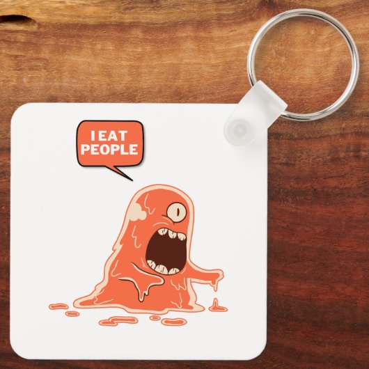 Monster eet mensen sleutelhanger (Achterkant)