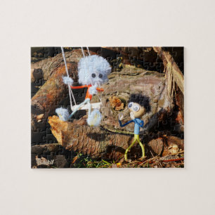 Monster Fubby op schommel. Legpuzzel