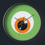 Monster Oogklok<br><div class="desc">Een monsteroogbal met een oranje iris en groene omgeving.</div>