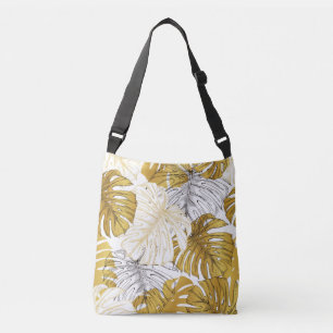 Monstera bladeren: goudwit crossbody tas