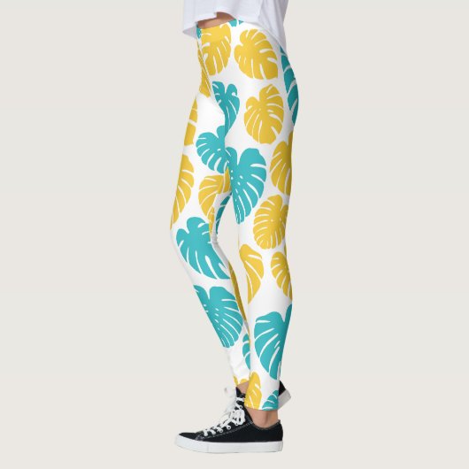 Monstera bladeren in turkoois, geel en wit leggings (Links)