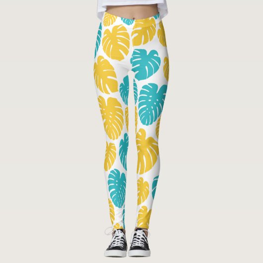 Monstera bladeren in turkoois, geel en wit leggings (Voorkant)